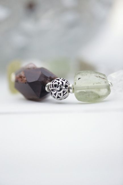 Detailed close-up of a beaded gemstone necklace
